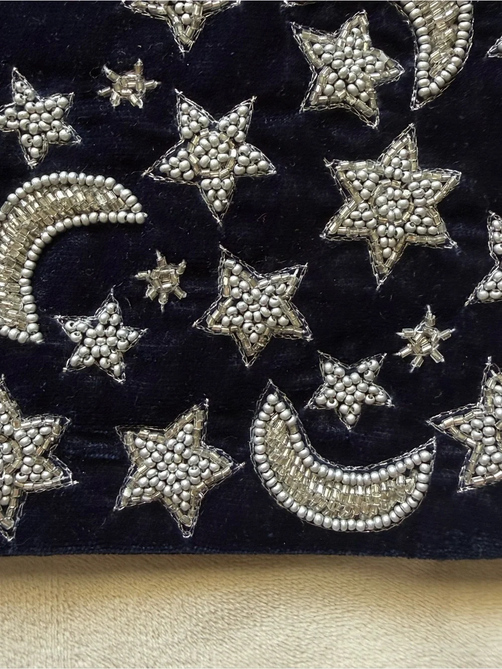 Beaded velvet clutch celestial print